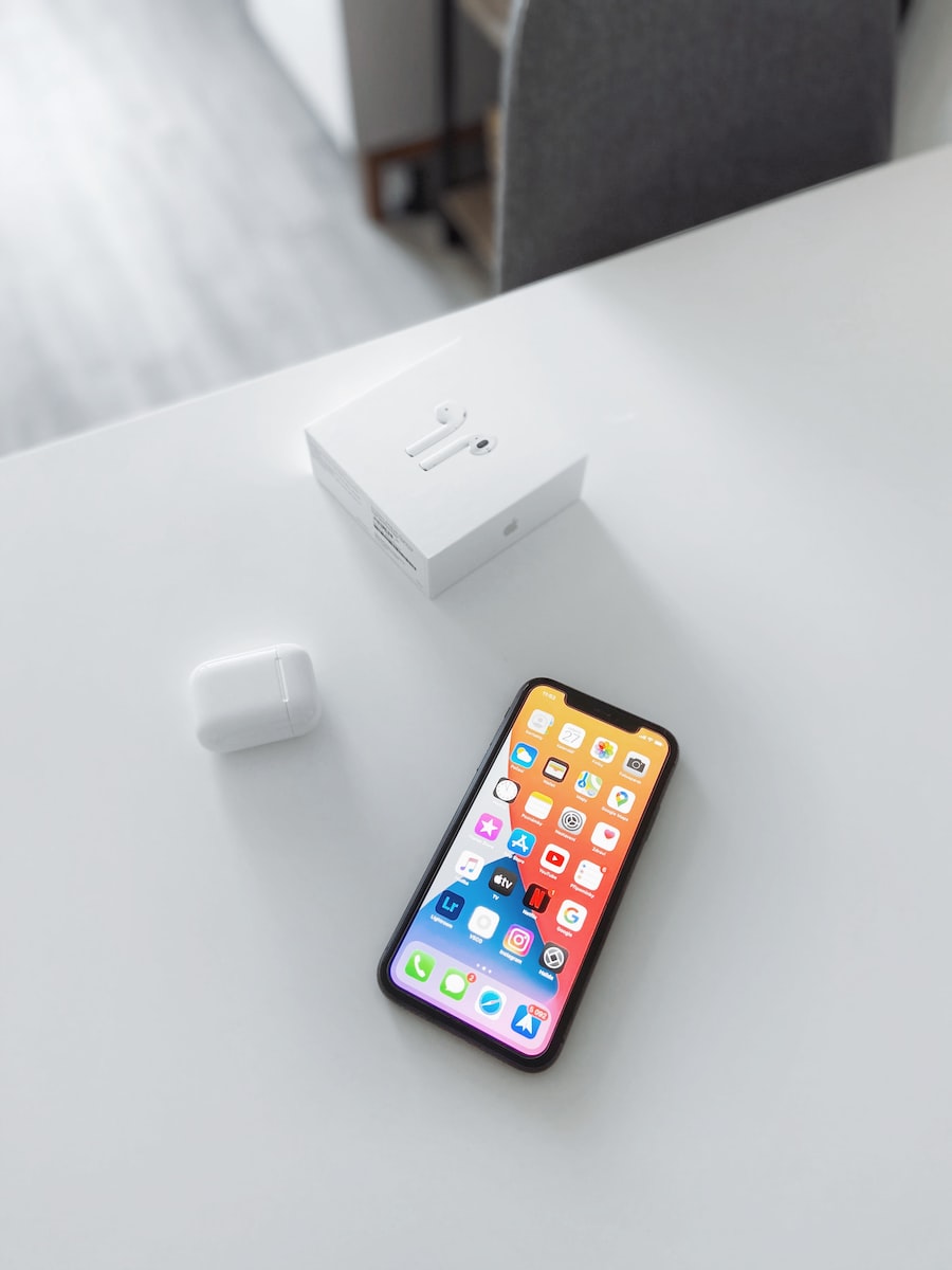 white apple charger beside white apple charger